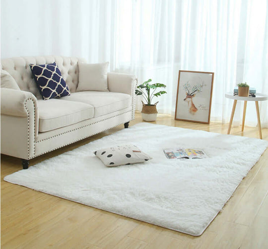 Silky fluffy carpet rug in cozy living room with light furniture, perfect for daily vacuuming and machine washing.