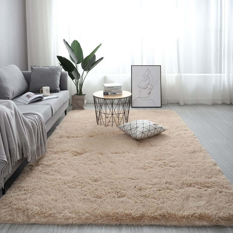 Nordic fluffy carpet rug in a cozy living room with a sofa, coffee table, and decorative pillow.