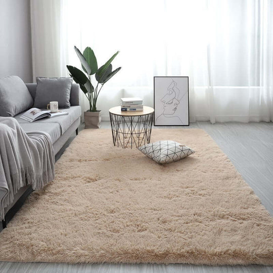 Nordic fluffy carpet rug in a cozy living room setting, enhancing decor with its plain design and soft texture.