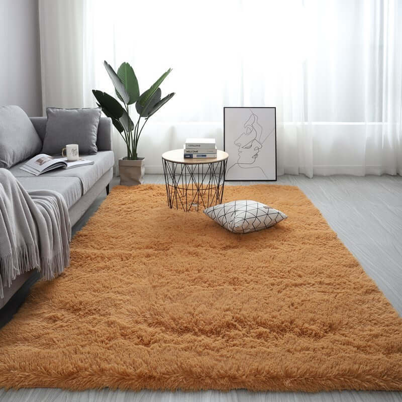 Nordic fluffy carpet rug in an orange hue, enhancing a cozy living room with a minimalist decor style.