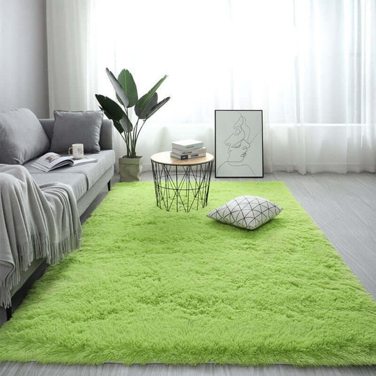 Nordic fluffy carpet rug in bright green, adorned with modern furniture and decor in cozy living room setting.