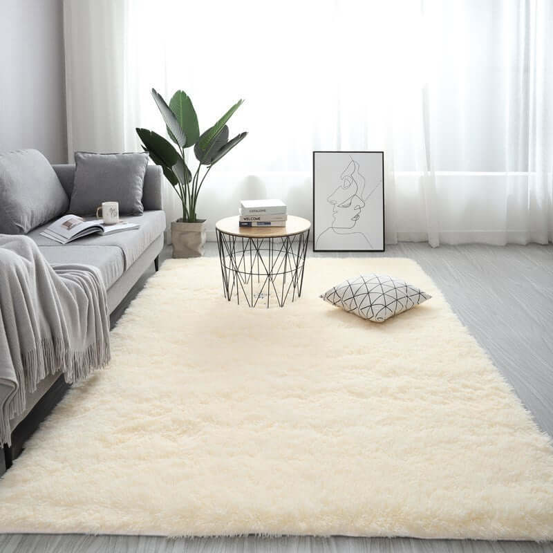 Nordic fluffy carpet rug in a modern living room setting with a sofa, table, and decor. Hand washable, rectangle, plain pattern.