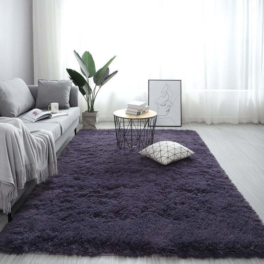 Nordic fluffy carpet rug in a stylish living room setting, featuring a cozy sofa and decorative elements.
