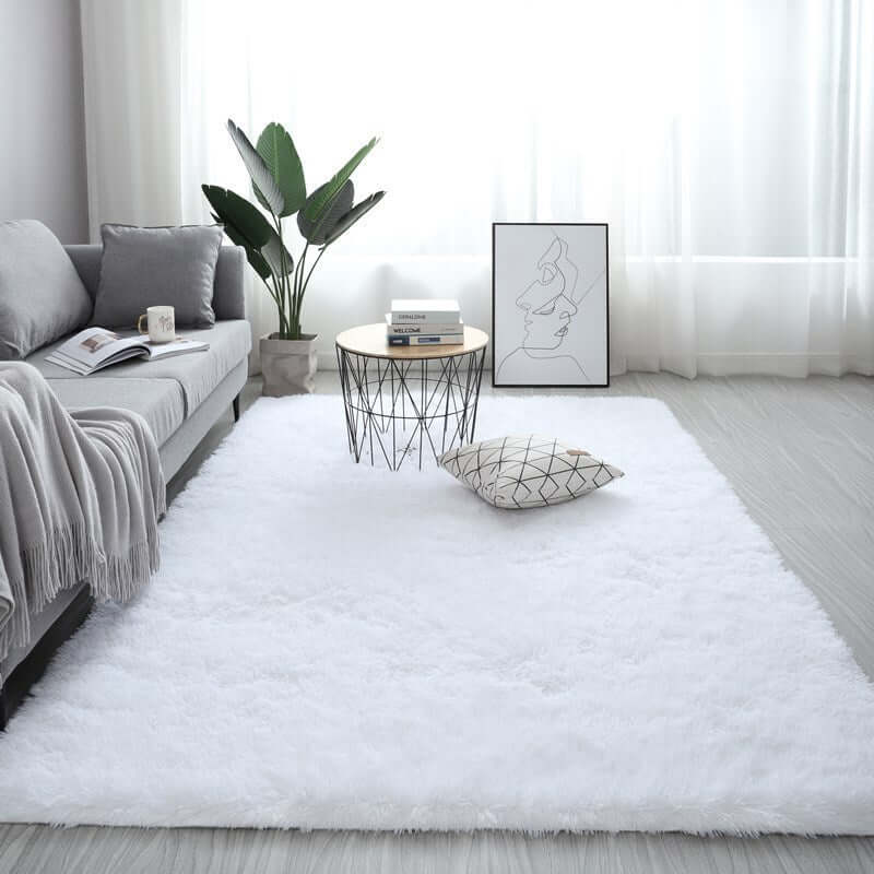 Nordic fluffy white carpet rug in bright living room with cozy decor and geometric table.