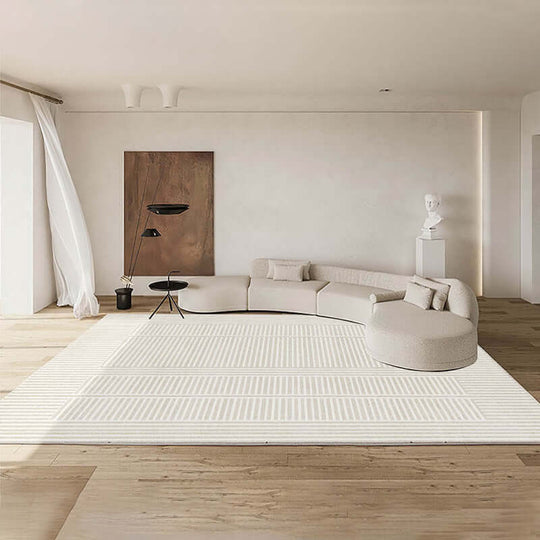 Minimalist thickened art carpet in a modern living room setting with a curved sofa and wooden flooring.